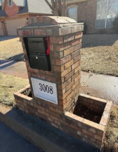 Angled view of completed brick mailbox rebuild project